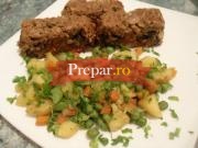 Rulada de carne tocata cu spanac si rosii cu garnitura de legume sote